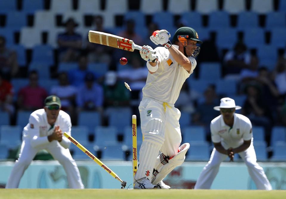 Australia's David Warner is bowled out by South Africa's Dale Steyn delivery during the first day of their cricket test match in Centurion February 12, 2014.