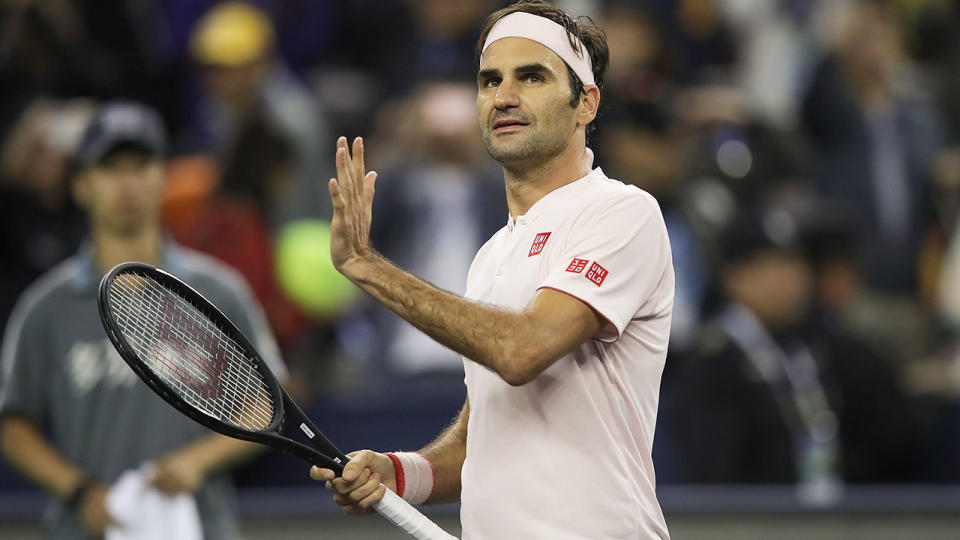 Roger Federer celebrates victory. (Photo by Lintao Zhang/Getty Images)