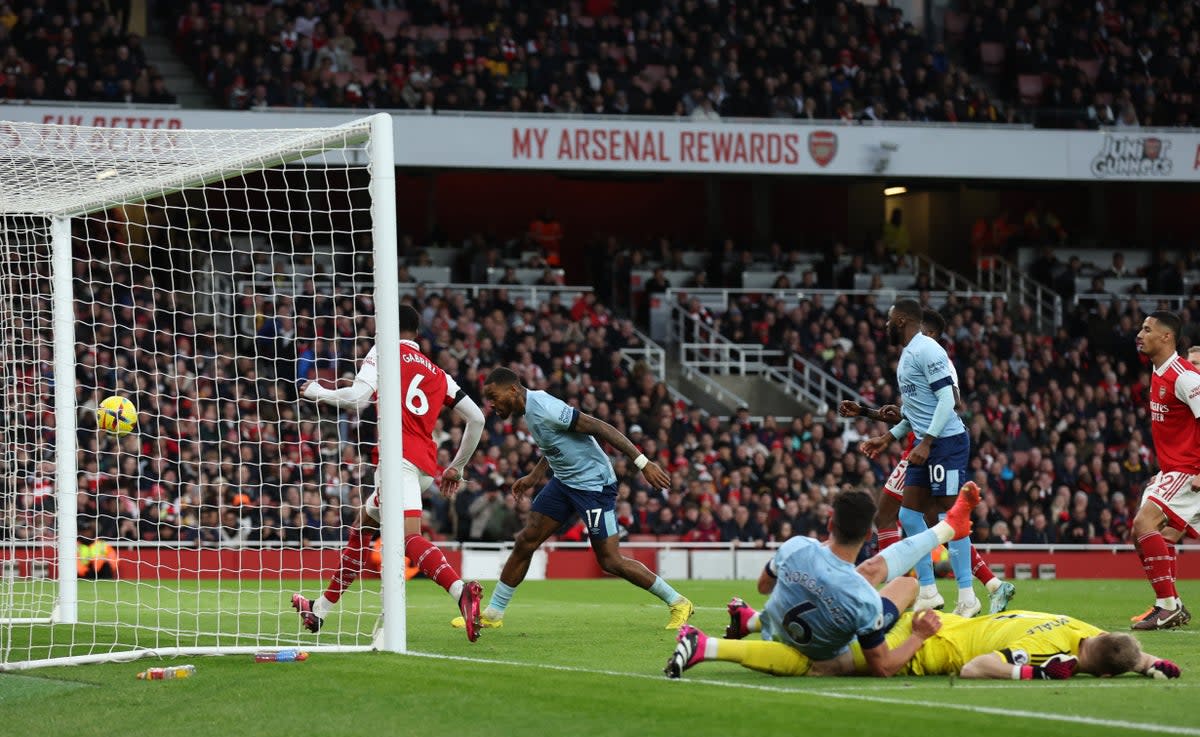 Ivan Toney scores Brentford’s equaliser at the Emirates (Reuters)