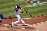 Pittsburgh Pirates starting pitcher JT Brubaker drives in two runs with a single off Chicago Cubs starting pitcher Trevor Williams during the second inning of a baseball game in Pittsburgh, Sunday, April 11, 2021. (AP Photo/Gene J. Puskar)