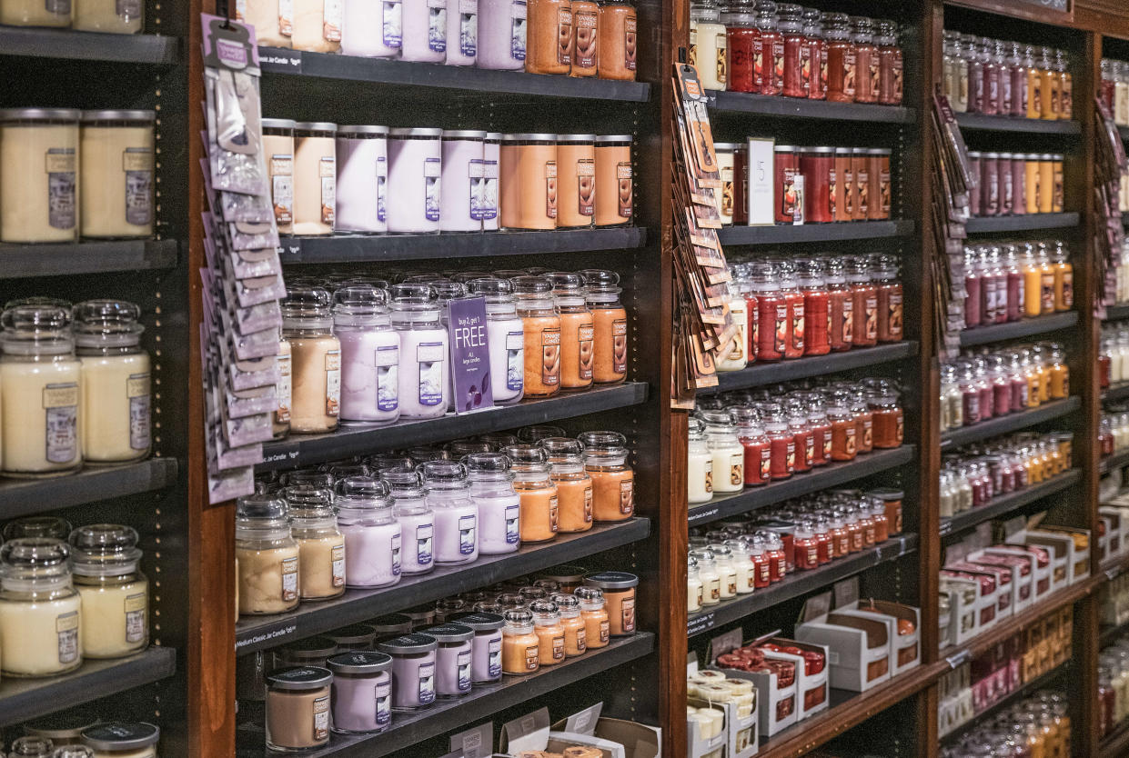 Scented candles on display at the Yankee Candle company store. In the absence of consistent COVID-19 data, some are looking to online candle reviews for signs of cases surging. 