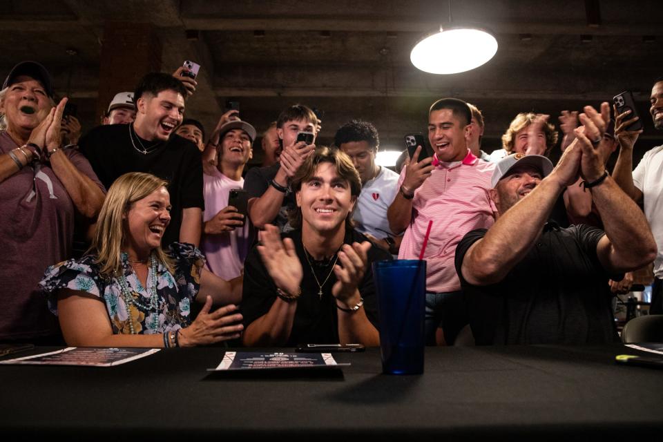 Former Sinton teammates and family cheer for Blake Mitchell after being picked No. 8 in the MLB draft by the Kansas City Royals on Sunday, July 9, 2023, in Sinton, Texas. 
