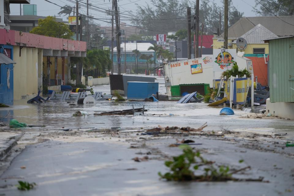 Hurricane Beryl floods a street in Hastings, Barbados on Monday (AP)