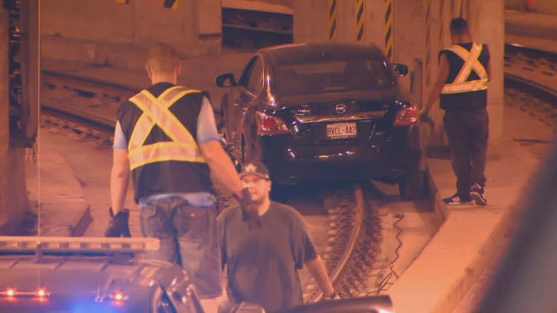 Car gets stuck after driving into TTC's Queens Quay tunnel