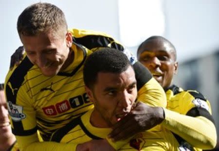 Britain Football Soccer - Watford v Aston Villa - Barclays Premier League - Vicarage Road - 30/4/16 Troy Deeney celebrates with teammates after scoring the third goal for Watford Reuters / Toby Melville Livepic