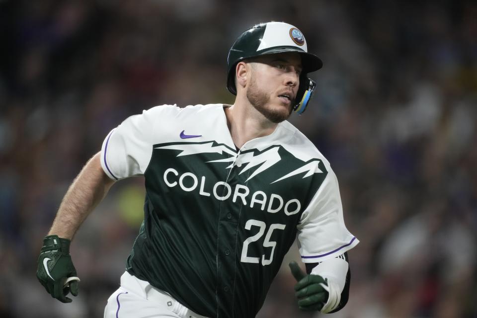 Colorado Rockies’ C.J. Cron heads toward first on a double against <a class="link " href="https://sports.yahoo.com/mlb/teams/detroit/" data-i13n="sec:content-canvas;subsec:anchor_text;elm:context_link" data-ylk="slk:Detroit Tigers;sec:content-canvas;subsec:anchor_text;elm:context_link;itc:0">Detroit Tigers</a> relief pitcher Jose <a class="link " href="https://sports.yahoo.com/mlb/players/9375" data-i13n="sec:content-canvas;subsec:anchor_text;elm:context_link" data-ylk="slk:Cisnero;sec:content-canvas;subsec:anchor_text;elm:context_link;itc:0">Cisnero</a> during the sixth inning of a baseball game Saturday, July 1, 2023, in Denver. | David Zalubowski, Associated Press