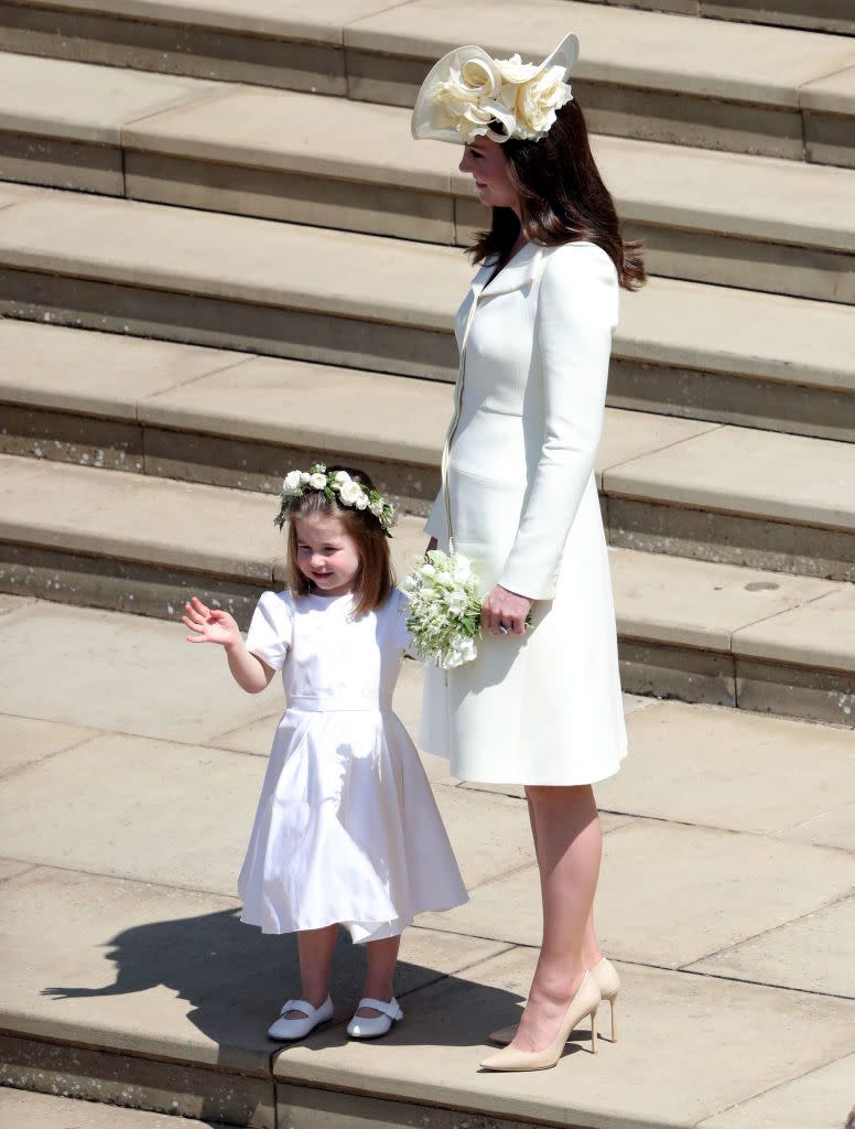 <p>The Duchess of Cambridge <a href="https://www.townandcountrymag.com/style/fashion-trends/a14522426/kate-middleton-dress-prince-harry-meghan-markle-wedding/" rel="nofollow noopener" target="_blank" data-ylk="slk:wore a yellow wool silk tailored coat;elm:context_link;itc:0;sec:content-canvas" class="link ">wore a yellow wool silk tailored coat</a> by Alexander McQueen to Prince Harry and Meghan Markle's wedding.</p>