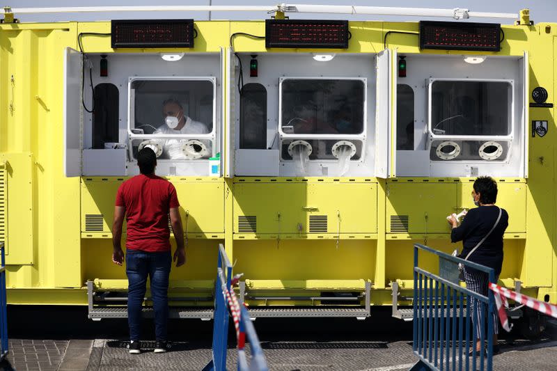 People are tested for the coronavirus disease (COVID-19) in East Jerusalem