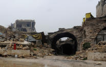 <p>A general view shows damage on the entrance to al-Zarab souk in the Old City of Aleppo, Syria, Dec. 13, 2016. (Photo: Omar Sanadiki/Reuters) </p>