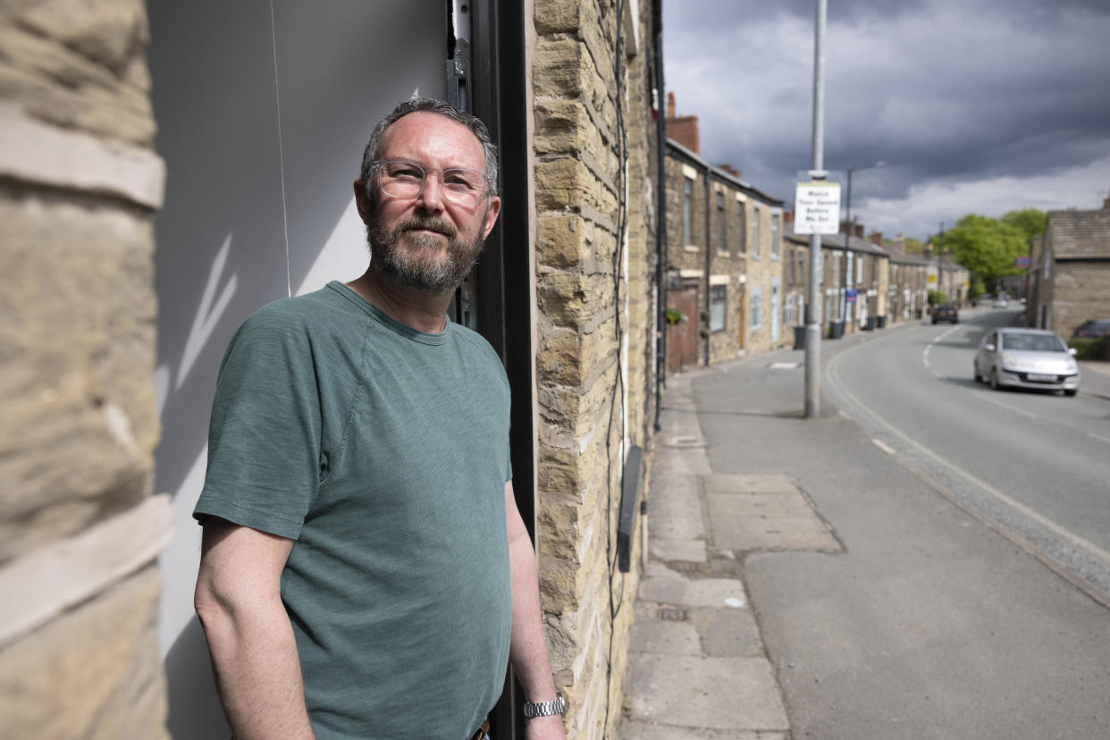 Lee Boardman says lorries and buses going over potholes on his street has caused damage to his home. (Reach)