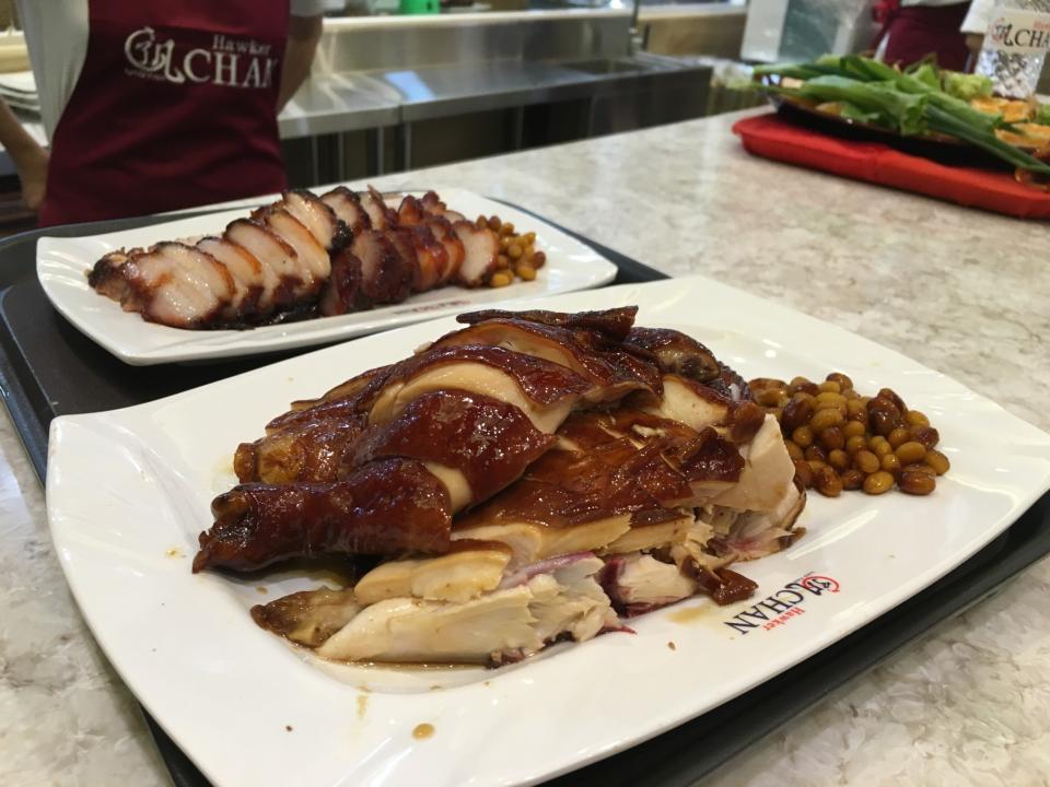 <p>First plates of char siew and chicken prepared at Hawker Chan. </p>