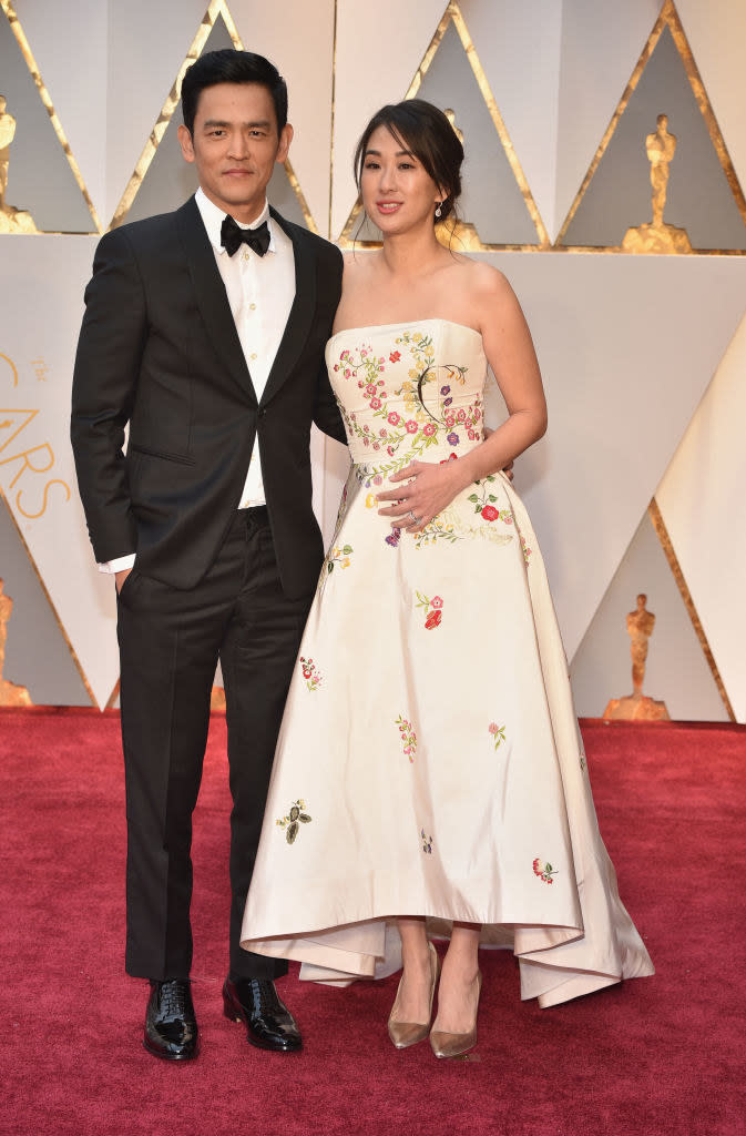 John on the red carpet in a bow tie with his wife, Kerri Higuchi