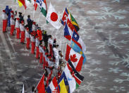 <p>Flag bearers from various nations attend the closing ceremony of the 2018 Winter Olympics in Pyeongchang, South Korea, Sunday, Feb. 25, 2018. (AP Photo/Charlie Riedel) </p>