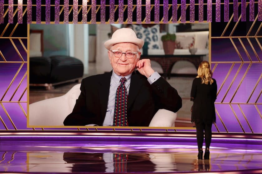 78th ANNUAL GOLDEN GLOBE AWARDS -- Pctured: (l-r) Honoree Norman Lear accepts the Carol Burnett Award with Amy Poehler at the 78th Annual Golden Globe Awards held at the Beverly Hilton Hotel on February 28, 2021. -- (Photo by: Christopher Polk/NBC)