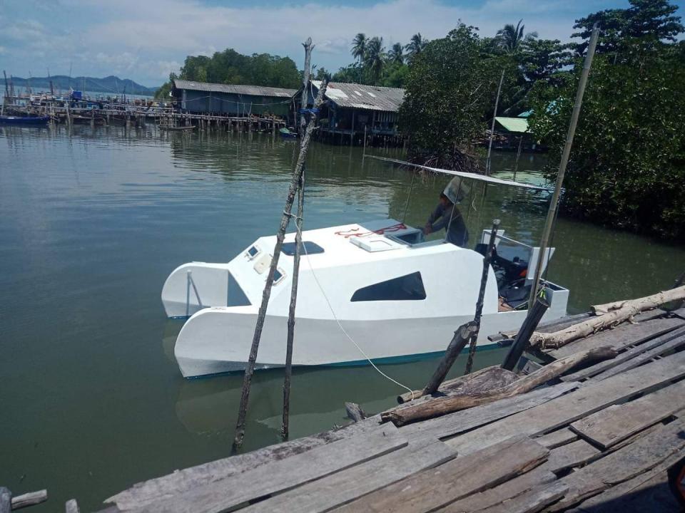 Robert Wojcik's boat nest to the pier. 