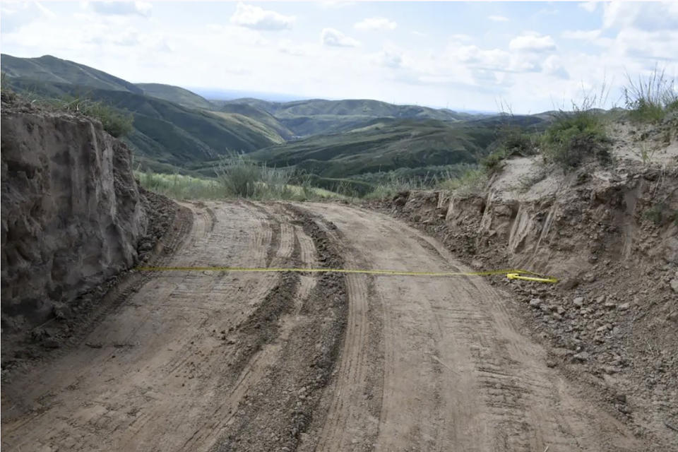 This photo taken from Aug. 31, 2023 online posting by the Youyu Police shows what appears to be a path cutting through a section of the ancient Great Wall in Youyu county in northern China's Shanxi province. Authorities in China arrested two people for smashing a path through a section of the ancient wall, a cultural icon and United Nations protected heritage site. (Youyu Police via AP)