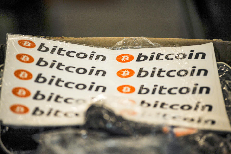 View of Bitcoin stickers placed at a local business, in Chiltuipan, La Libertad, El Salvador on 6 June. Photo: Camilo Freedman/SOPA/LightRocket via Getty