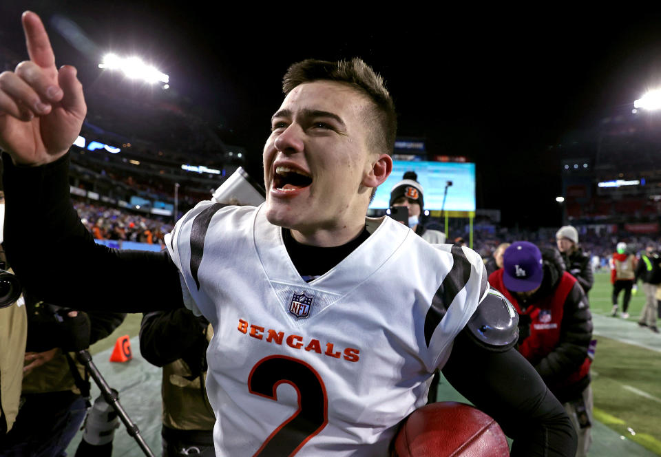 Kicker Evan McPherson of the Cincinnati Bengals celebrates after hitting the game winning field goal to give the Bengals a 19-16 win over the Tennessee Titans in the AFC Divisional Playoff game at Nissan Stadium.