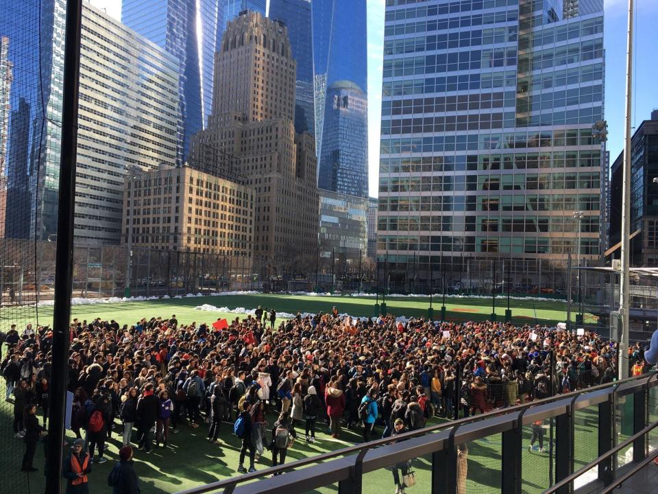 Students from Stuyvesant High School walk out in New York City.