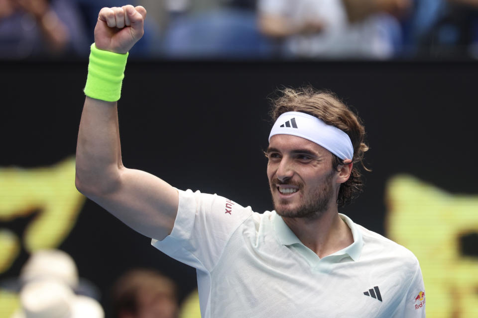 Stefanos Tsitsipas of Greece celebrates after defeating Luca Van Assche of France in their third round match at the Australian Open tennis championships at Melbourne Park, Melbourne, Australia, Friday, Jan. 19, 2024. (AP Photo/Asanka Brendon Ratnayake)