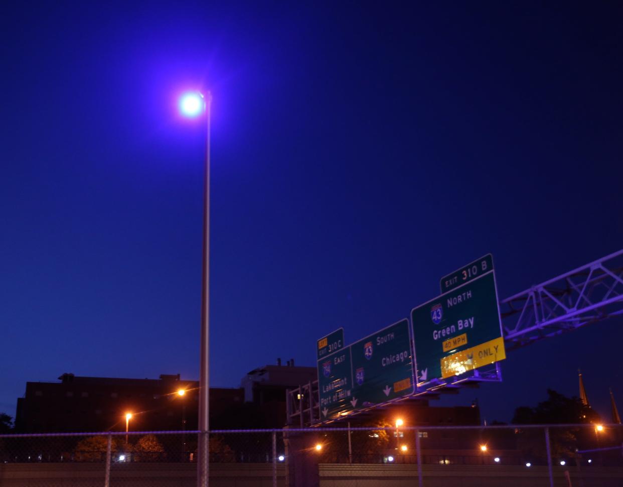 A purple streetlight is seen near the 400 block of North 15th Street in Milwaukee on Friday, July 2, 2021. Many residents have noticed purple-hued streetlights on the interstate throughout the Milwaukee area. There is a technical glitch in the LED bulbs installed by the state Department of Transportation roughly three years ago, and they will be replaced.