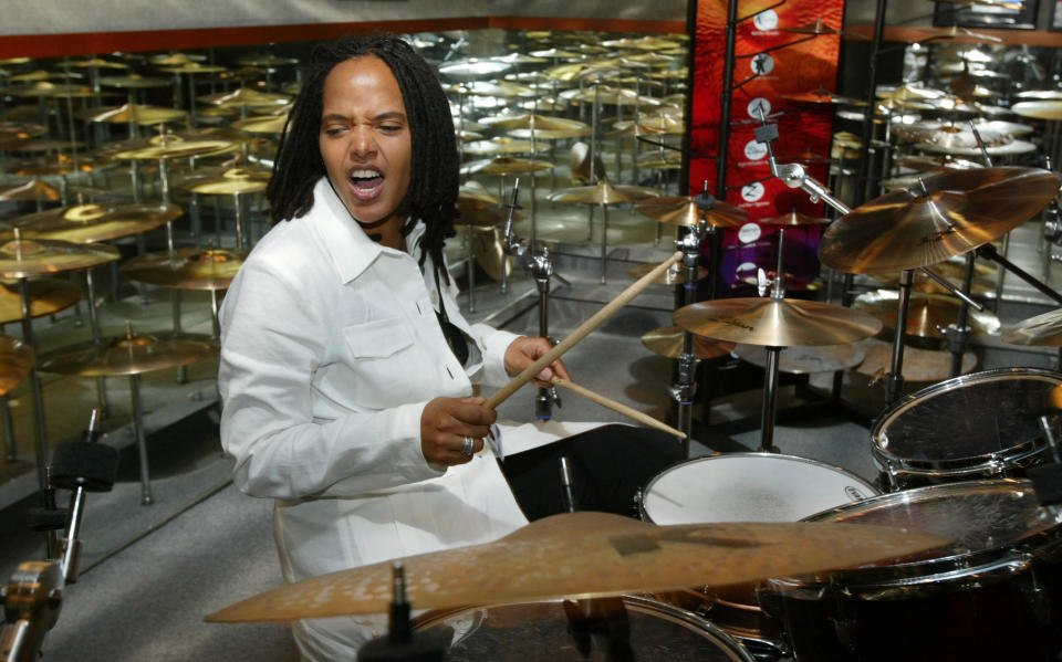 FILE - Drummer Terri-Lyne Carrington plays a set of drums with Zildjian cymbals, in a room of Zildjian cymbals, during the 380th anniversary of the famous cymbal maker in Norwell, Mass., on May 9, 2003. The three-time Grammy winner is nominated for best instrumental jazz album – an award she won in 2014 and is the only woman to do so in the show’s 63-year history. (AP Photo/Julia Malakie, File)