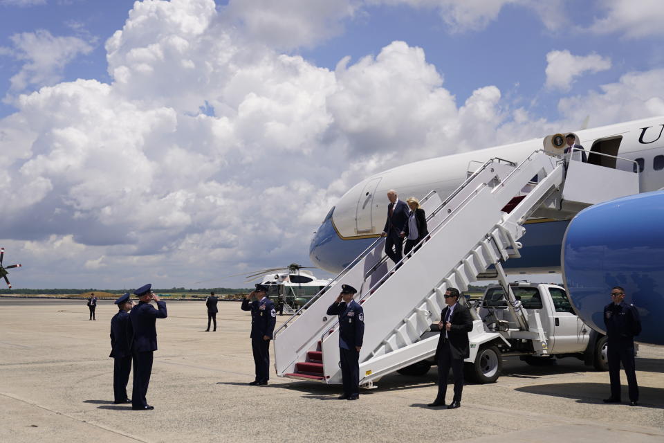 President Joe Biden and first lady Jill Biden walk off Air Force One at Andrews Air Force Base, Md., Friday, June 4, 2021. Biden returns to the White House after spending a few days in Rehoboth Beach to celebrate first lady Jill Biden's 70th birthday. (AP Photo/Andrew Harnik)