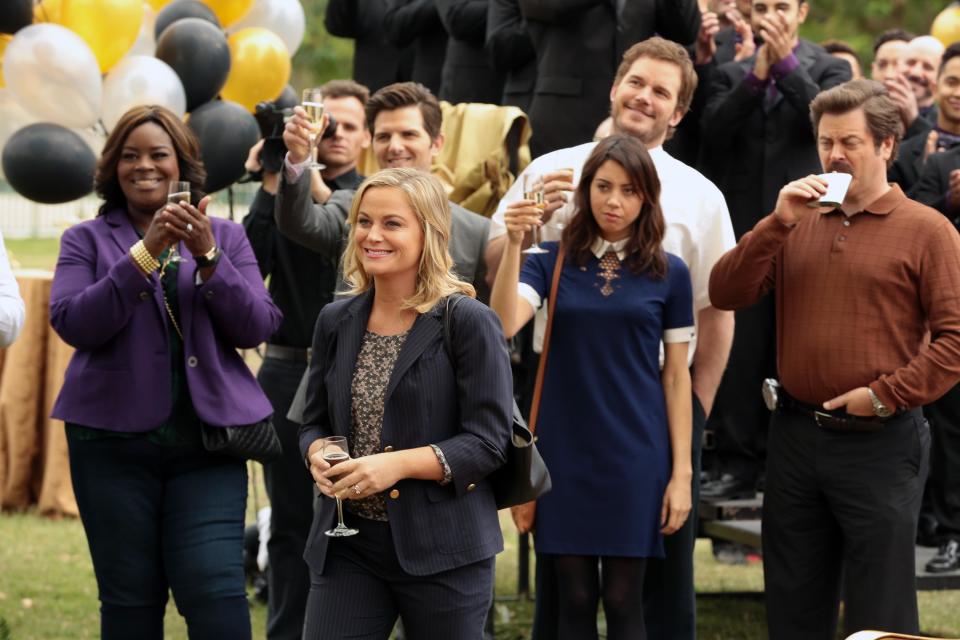 PARKS AND RECREATION -- Viva Gunderson! Episode 711 -- Pictured: (l-r) Retta as Donna Meagle, Adam Scott as Ben Wyatt, Amy Poehler as Leslie Knope, Aubrey Plaza as April Ludgate, Nick Offerman as Ron Swanson -- (Photo by: Chris Haston/NBC)