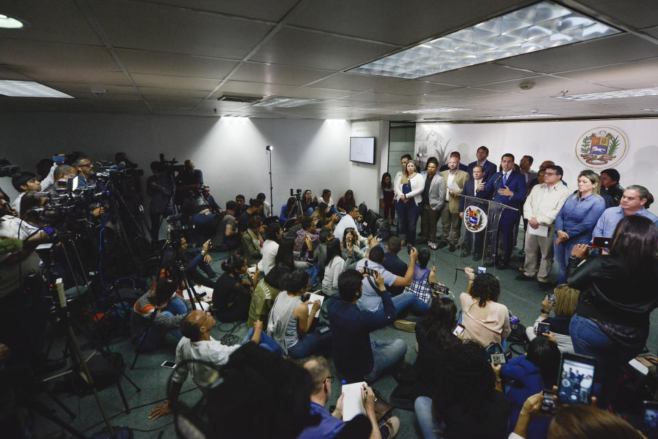 Opposition leader Juan Guaido gives a press conference in Caracas, Venezuela, Monday, Jan. 6, 2020. Guaido was expected to be reelected head of the opposition-dominated legislature the previous day, but security forces blocked him and other opposition lawmakers from entering the session where lawmakers loyal to President Nicolas Maduro rushed to choose a substitute leader from a small faction of opposition deputies recently banished for allegedly taking government bribes.(AP Photo/Matias Delacroix)