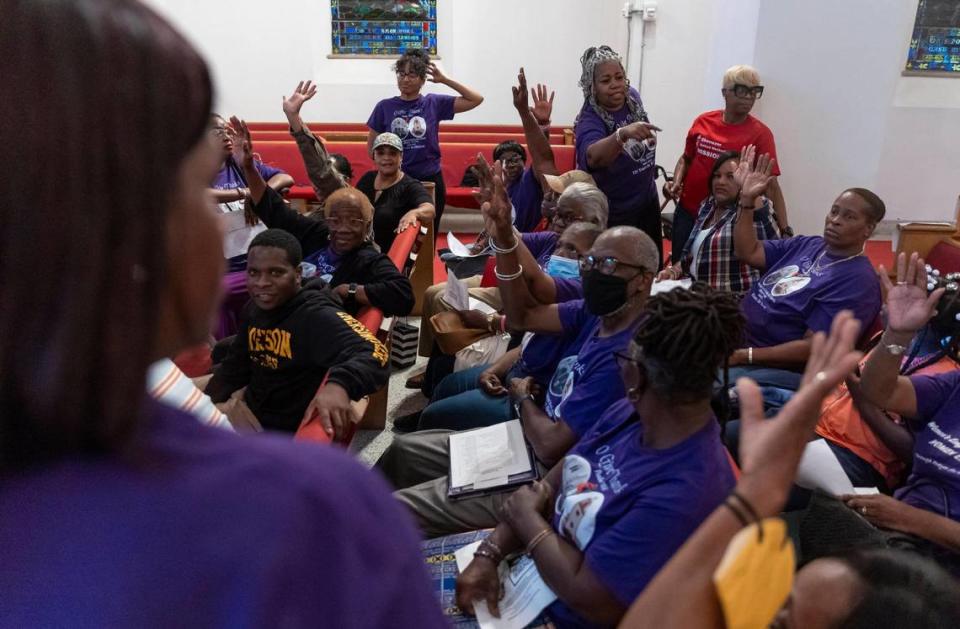 Members of the Ebenezer United Methodist Church tally up votes and discuss rising rents and homeowner’s insurance costs during an annual assembly meeting for the interfaith nonprofit PACT (People Acting for Community Together).