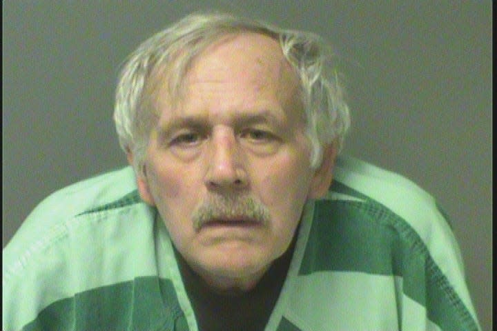 Dennis Carlson, 65, is charged with five counts of animal neglect and three counts of failure to dispose of a dead animal.