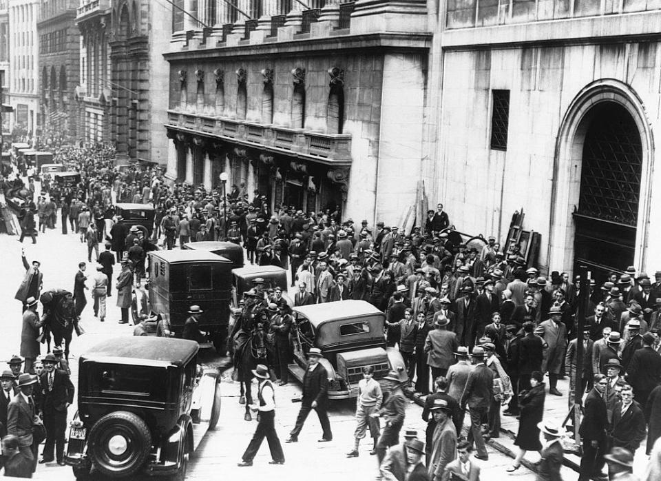 stock traders flood the streets outside the stock exchange on the day of the market crash