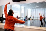 Shanghai Ballet dancers wearing masks practise in a dance studio in Shanghai