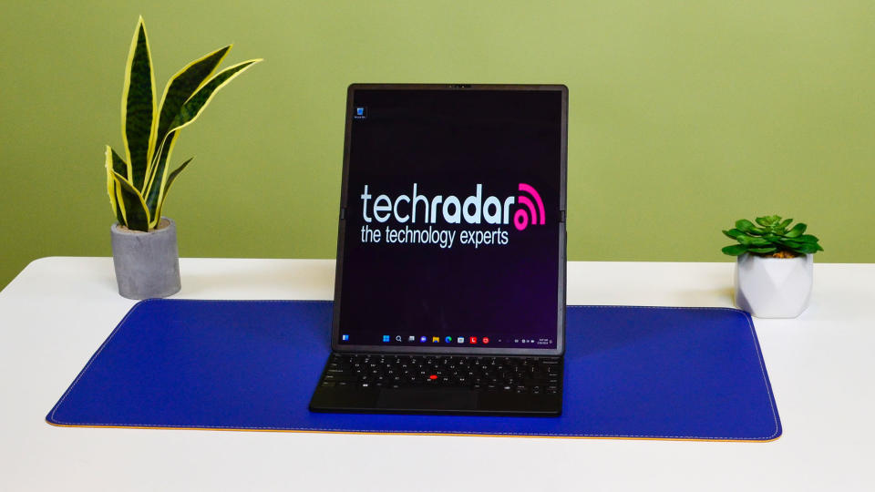 A Lenovo ThinkPad X1 Fold 16 Gen 1 on a white desk