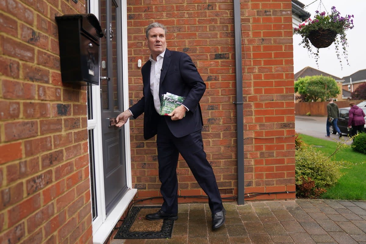 Sir Keir delivered Labour flyers to a street of houses (Jacob King/PA) (PA Wire)