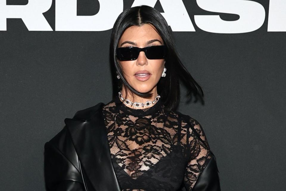 Kourtney Kardashian attends the Boohoo by Kourtney Kardashian Barker fashion show during New York Fashion Week at The High Line in New York City on Sept. 13, 2022. - Credit: Photo by Jamie McCarthy/Getty Images for Boohoo