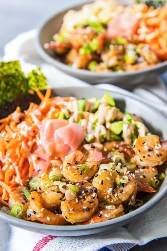 <p>The Flavor Bender</p><p>A delicious shrimp lunch recipe packed with tangy, sweet, spicy flavors— these easy teriyaki shrimp rice bowls are quick, easy, versatile and filling!</p><p><strong>Get the recipe: <a href="https://www.theflavorbender.com/easy-teriyaki-shrimp-rice-bowls/" rel="nofollow noopener" target="_blank" data-ylk="slk:Easy Teriyaki Shrimp Rice Bowls;elm:context_link;itc:0;sec:content-canvas" class="link rapid-noclick-resp">Easy Teriyaki Shrimp Rice Bowls</a></strong></p><p><strong>Related: <a href="https://parade.com/1325505/parade/shrimp-recipes/" rel="nofollow noopener" target="_blank" data-ylk="slk:100+ Best Shrimp Recipes For Easy Dinner Ideas;elm:context_link;itc:0;sec:content-canvas" class="link rapid-noclick-resp">100+ Best Shrimp Recipes For Easy Dinner Ideas</a></strong></p>