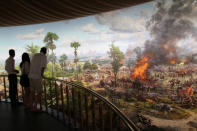 <p>Tourists view a painting on the wall of the Angkor Panorama Museum in Siem Reap, Cambodia, on May 23, 2016. (Mak Remissa/EPA) </p>