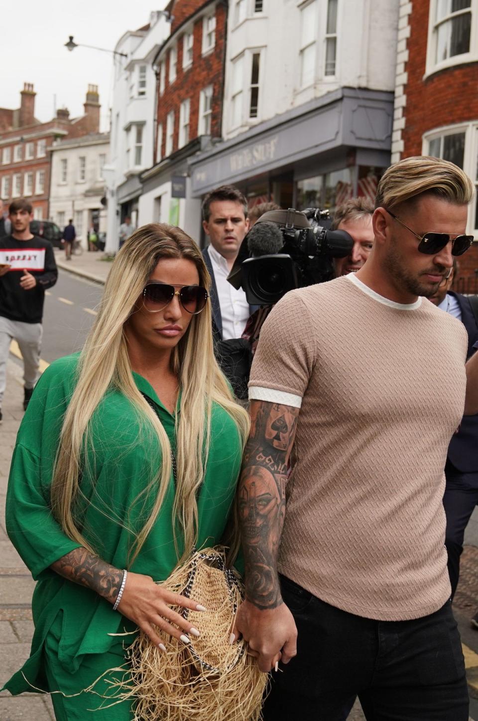 Katie Price leaves Lewes Crown Court in June after pleading guilty to breaching a restraining order (Gareth Fuller/PA) (PA Wire)