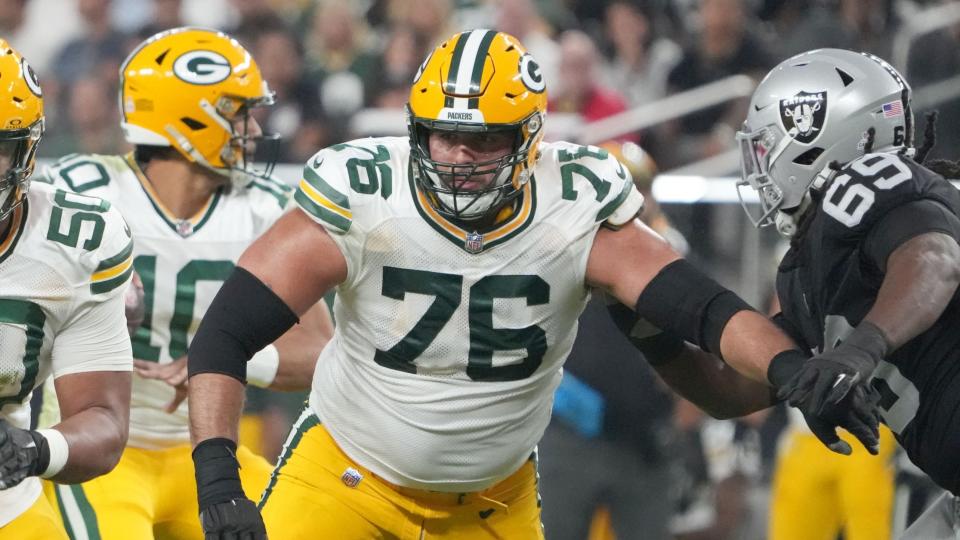 Oct 9, 2023; Paradise, Nevada, USA; Green Bay Packers guard Zach Tom (50) and guard Jon Runyan (76) against the Las Vegas Raiders in the first half at Allegiant Stadium.