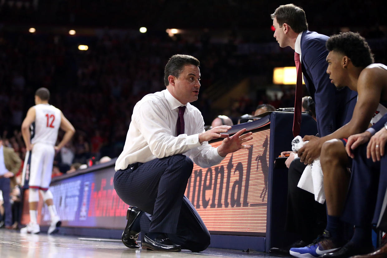 The specter of the FBI investigation will hang over not just Arizona but this entire college basketball season. (Getty)