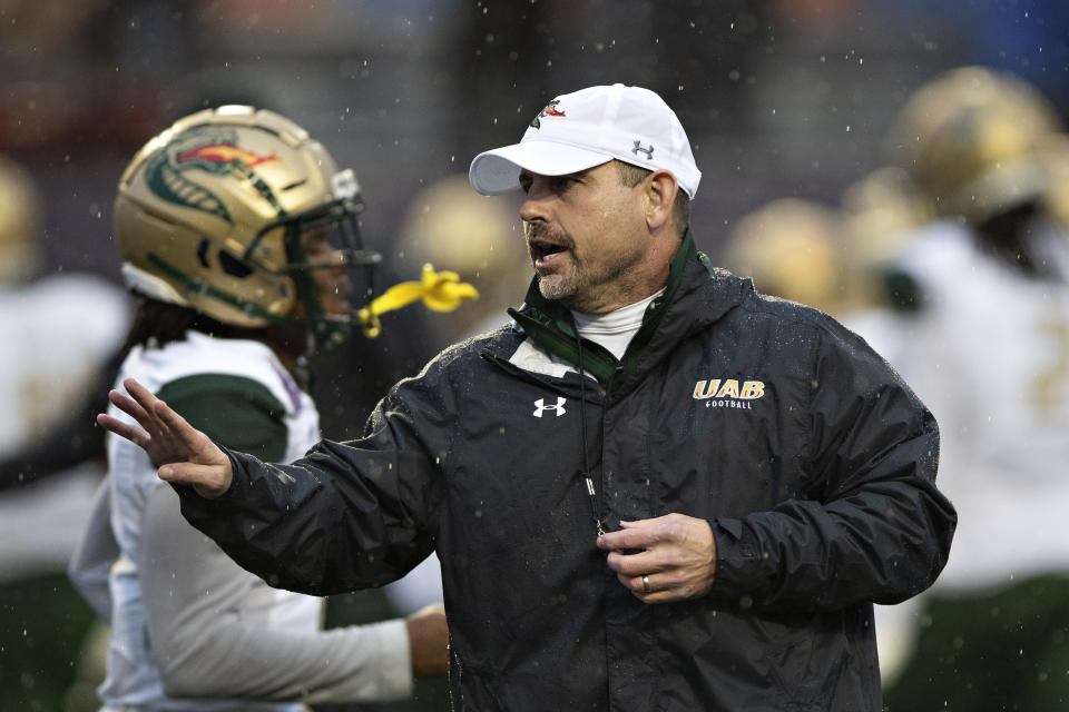 SHREVEPORT, LOUISIANA - DECEMBER 18: Head Coach Bill Clark of the UAB Blazers watches his team warm up before a game against the BYU Cougars during the Radiance Technologies Independence Bowl at Independence Stadium on December 18, 2021 in Shreveport, Louisiana. (Photo by Wesley Hitt/Getty Images)