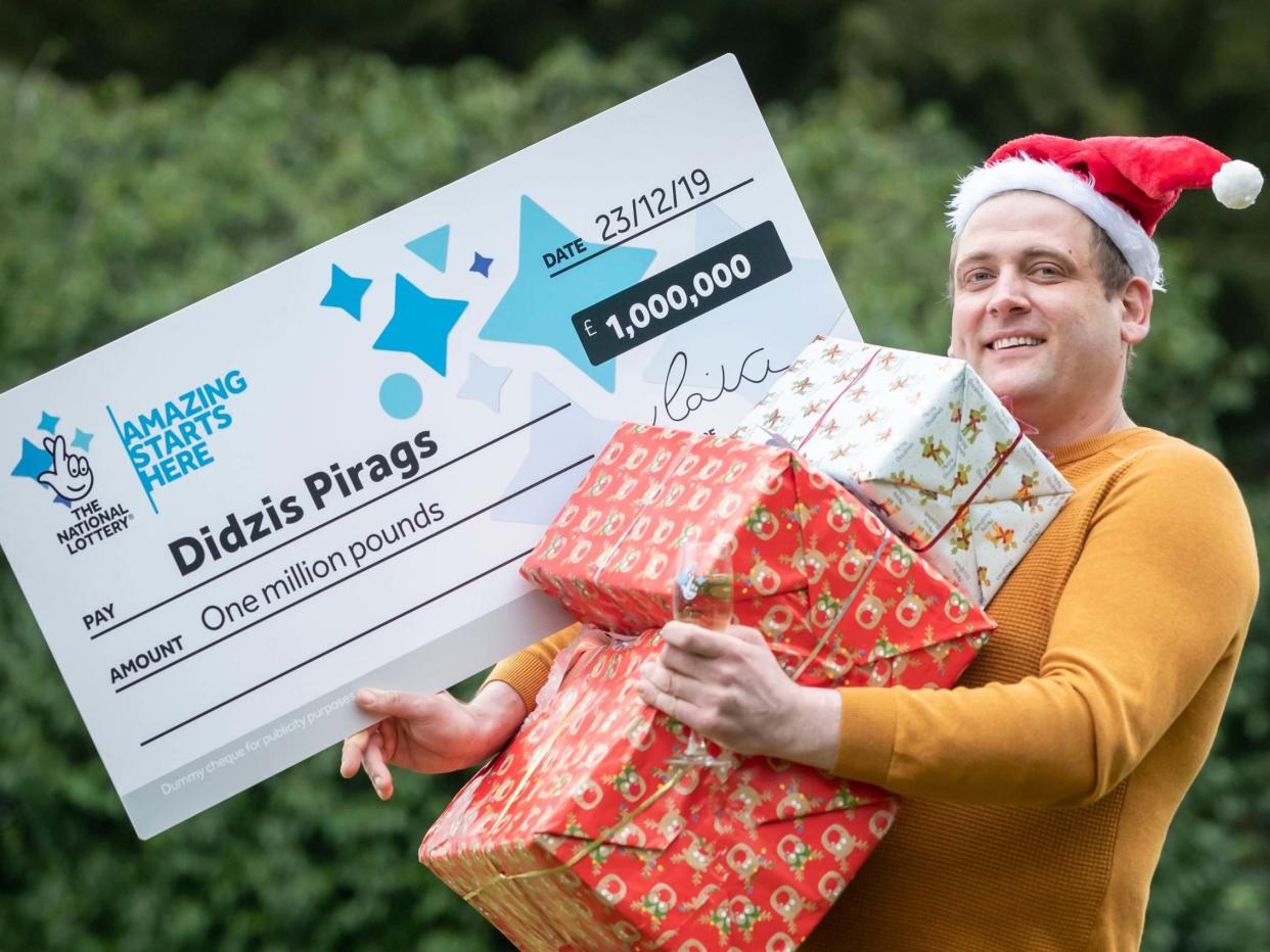 Didzis Pirags celebrates his National Lottery Merry Millions win in Preston: Danny Lawson/PA Wire