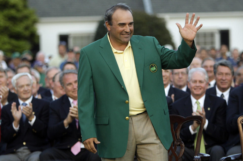 FILE- Masters golf champion Angel Cabrera, of Argentina, waves after receiving his green jacket at the Augusta National Golf Club in Augusta, Ga., on April 12, 2009. As the Masters unfolds this week, 2009 winner Angel Cabrera sits in an Argentinian prison. (AP Photo/Rob Carr, File)