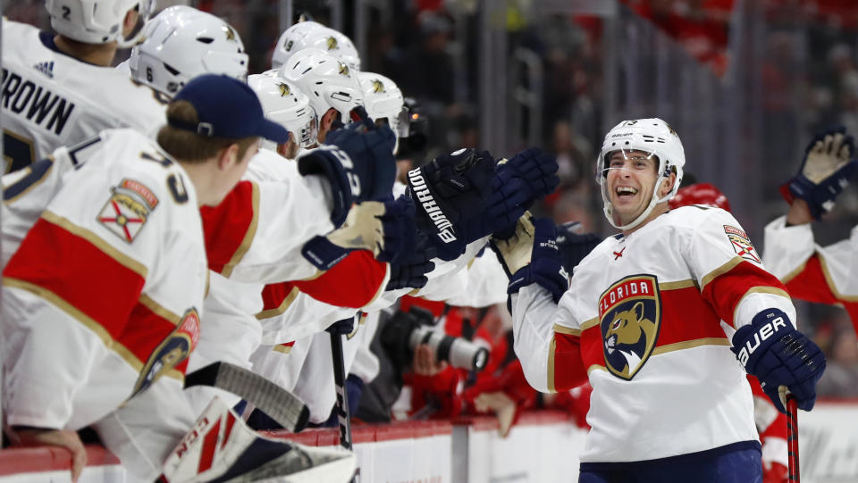 Florida Panthers defenseman Mark Pysyk is congratulated for his goal against the Detroit Red Wings during the first period of an NHL hockey game Saturday, Jan. 18, 2020, in Detroit. (AP Photo/Paul Sancya)