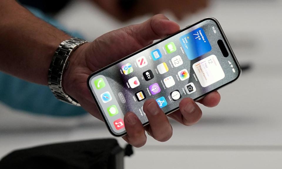 <span>The iPhone 15 Pro is shown after its introduction on the Apple campus, September 2023. </span><span>Photograph: Jeff Chiu/AP</span>