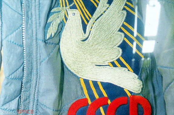 Valentina Tereshkova's Vostok 6 mission patch, as seen still sewn to the thermal garment that she wore in space in 1963. See collectSPACE.com for the full patch and additional photos.