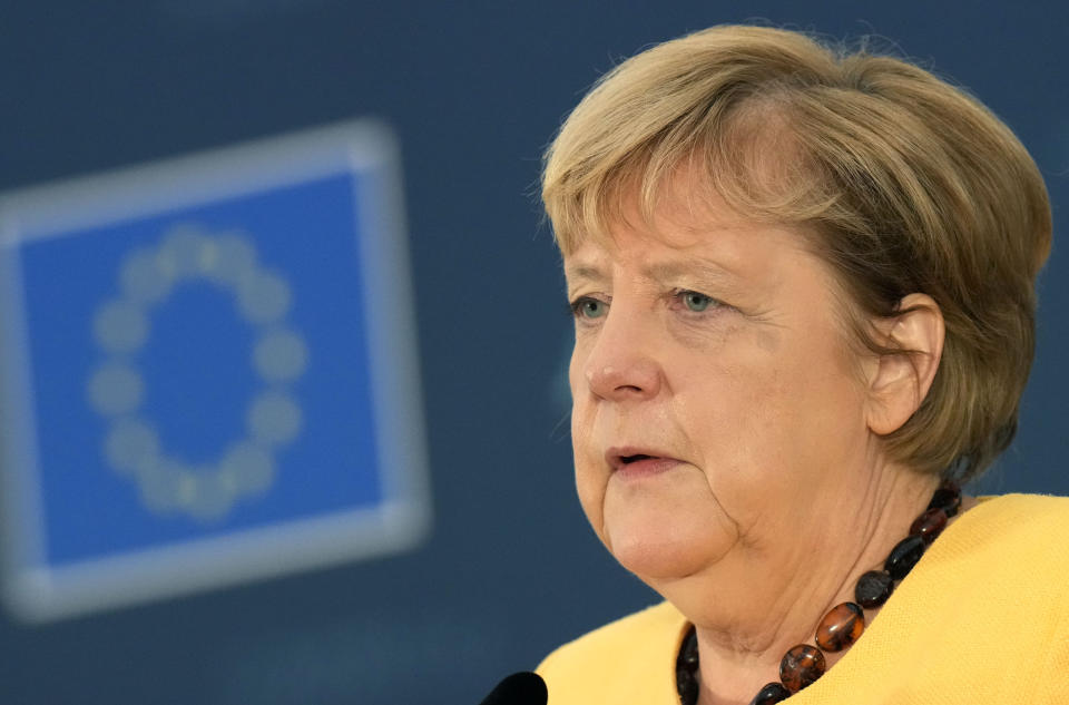 German Chancellor Angela Merkel speaks during a media conference at the conclusion of an EU summit at the Brdo Congress Center in Kranj, Slovenia, Wednesday, Oct. 6, 2021. European Union leaders gathered Wednesday to reassure six countries in the Balkans region that they could join the trading bloc one day if they can meet its standards but are unlikely to give any signal even about when they might advance in their quests. (AP Photo/Petr David Josek)