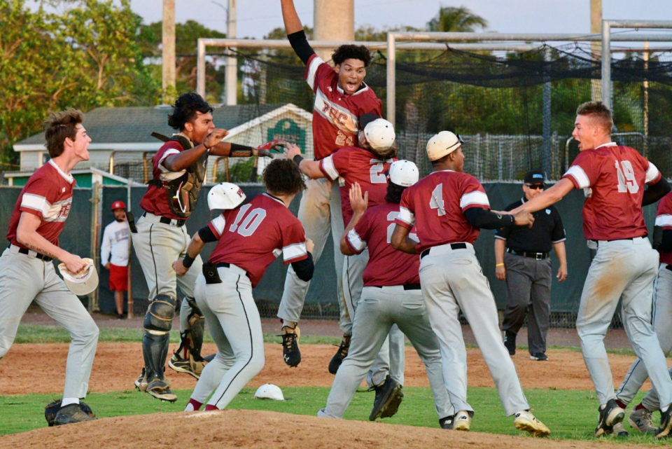 Palm Beach Central's Cameron Smith jumps up in celebration with his teammates following the final out of Tuesday's 6-5 regional quarterfinals victory over Jupiter on May 10, 2022.