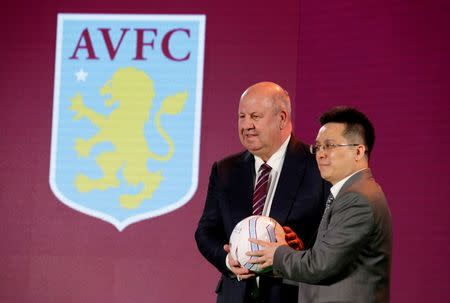 English soccer club Aston Villa CEO Keith Wyness (L) and Recon Group CEO Tony Xia attend a news conference for Recon Group's acquisition of soccer club Aston Villa in Beijing, China, July 18, 2016. REUTERS/Jason Lee/File Photo